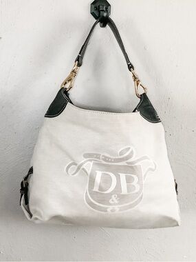 Dooney & Bourke Cream Signature Canvas Slouch Shoulder Bag with Black Trim
